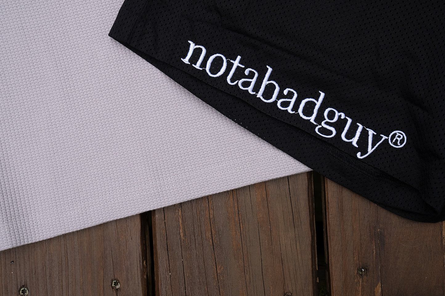 “notabadguy” porthole mesh shorts